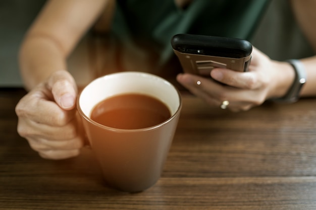 Hot coffee cup on table at morning, relax time, latte coffee