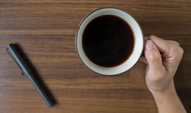 Hot coffee cup on table at morning, relax time, latte coffee