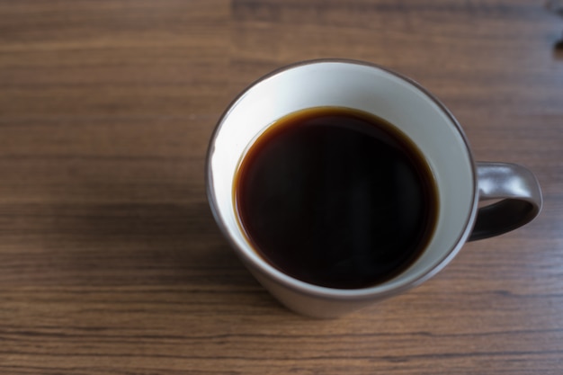 Hot coffee cup on table at morning, relax time, latte coffee