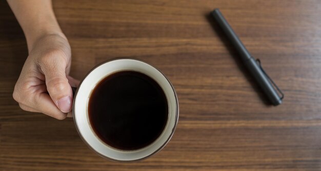 hot coffee cup on table at morning relax time latte coffee