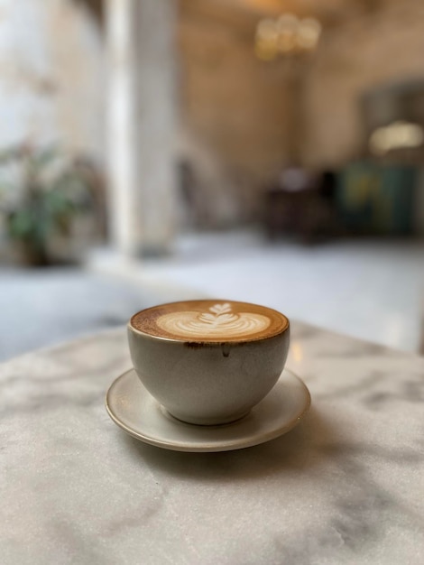 Hot coffee cup on table