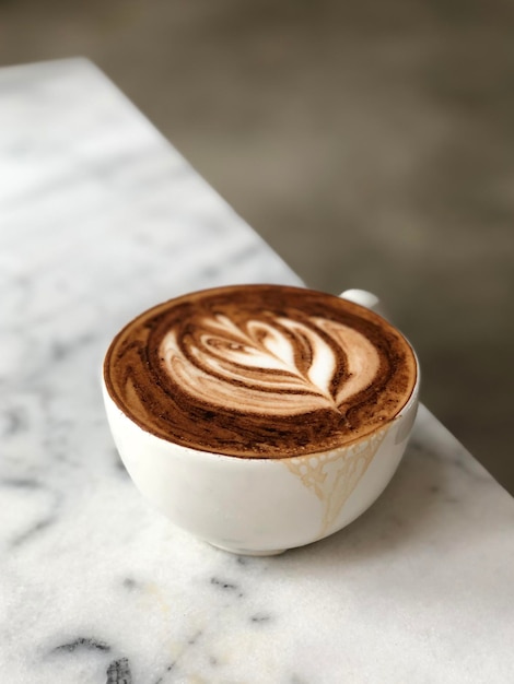 Hot coffee cup on table