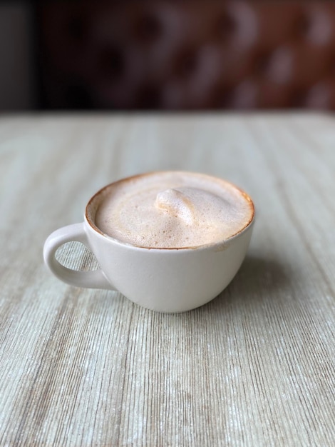 Hot coffee cup on table