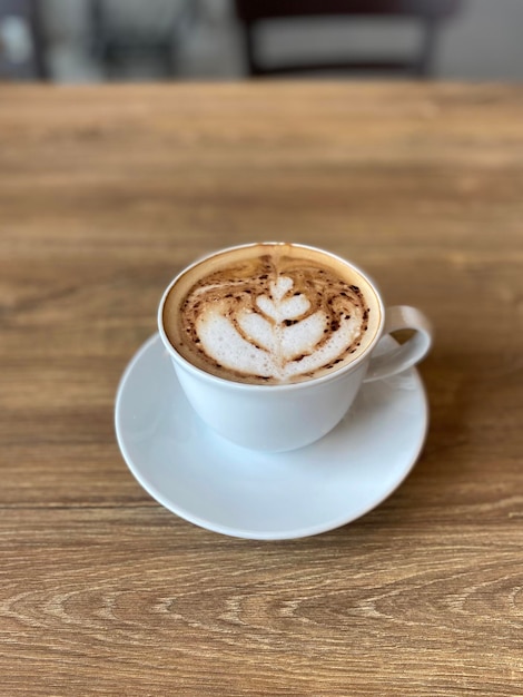 Hot coffee cup on table