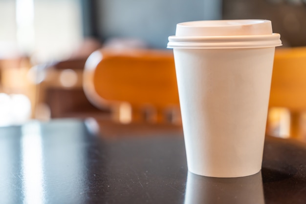 hot coffee paper cup in coffee shop