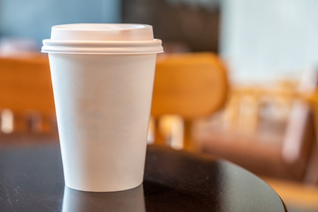 hot coffee paper cup in coffee shop