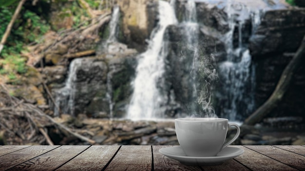 A hot coffee on the table on a natural background