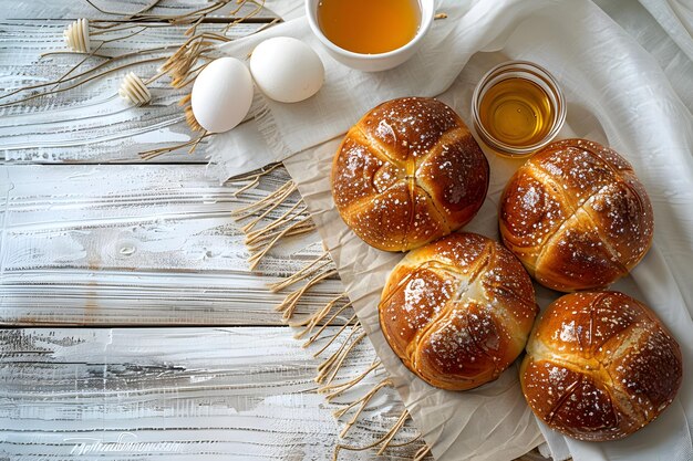 Photo hot cross buns with raisins and honey on rustic background traditional easter dessert food