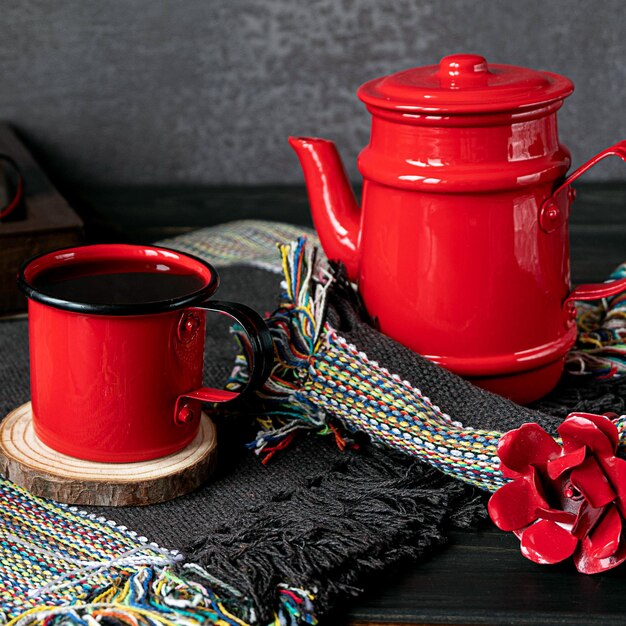 Hot freshly brewed coffee served in a red coffee set