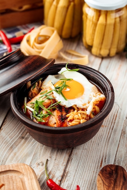 Hot korean chocken ramen noodles with fried egg