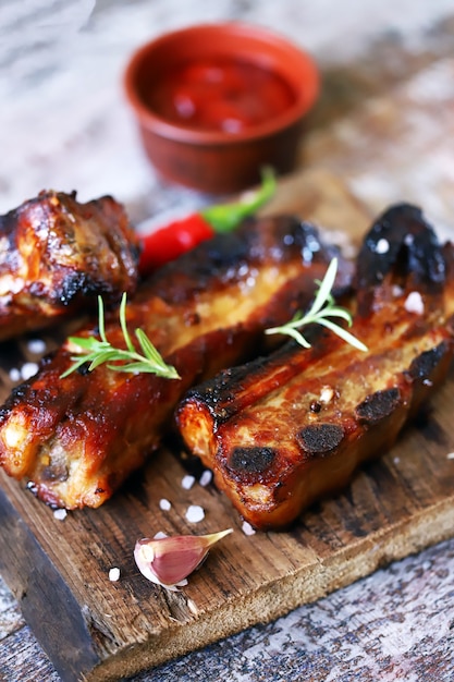 Hot ribs baked in honey and mustard sauce with chili pepper