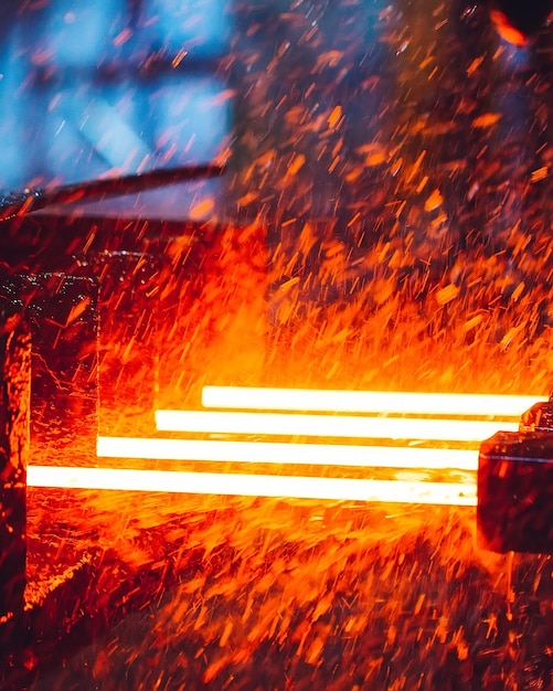 Hot steel on conveyor in steel mill