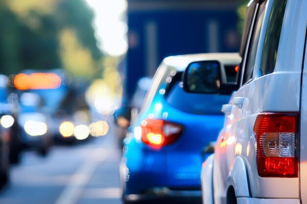 hot summer day on the road landscape in traffic jam / abstract urban view in traffic