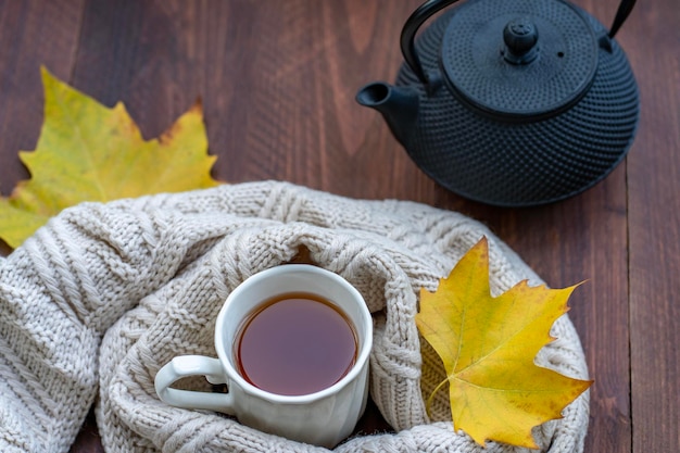 Hot tea with fall foliage