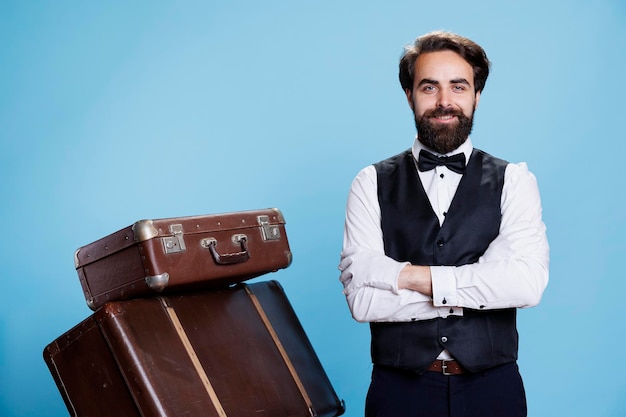 Hotel bellhop with luggage