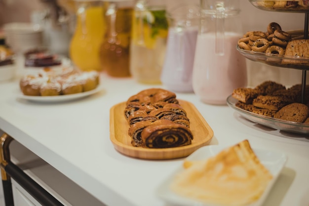 Hotel breakfast served on buffet table