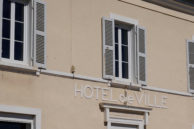 Hotel de ville and salle des fetes french sign text means town hall and village hall party room facade in city center in village france on building entrance