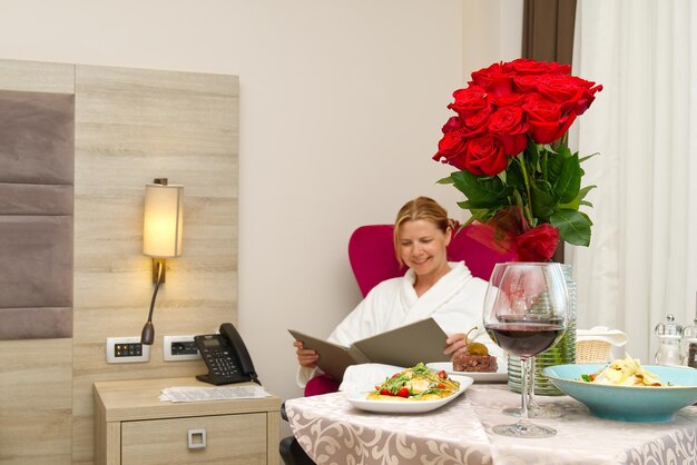 Hotel room service dinner and flowers Romantic vacation