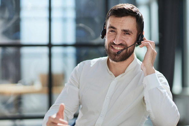 Hotline and helpdesk support operator working in office