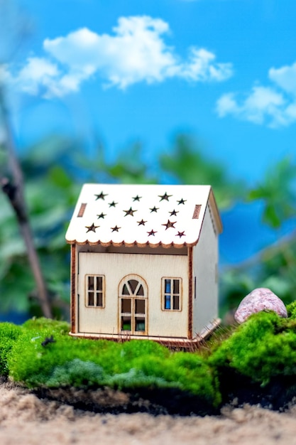 A house in nature in an ecologically clean area Toy wooden house