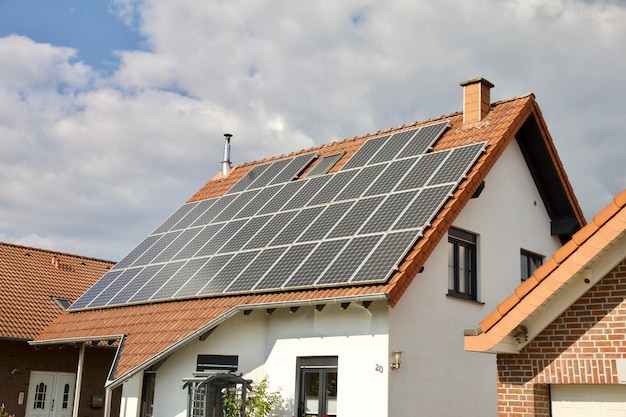 House roof with solar panels on it