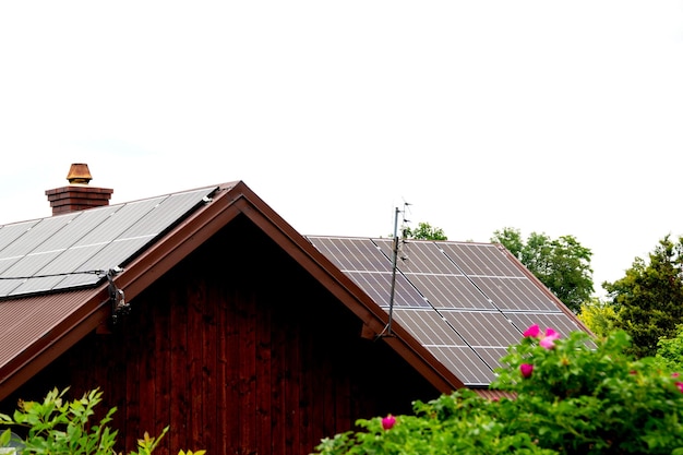 A house with a large solar panel on the roof