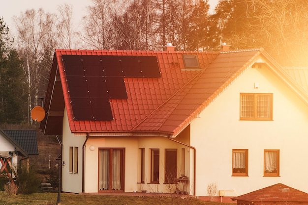 House with a solar panel Photovoltaics on the red roof