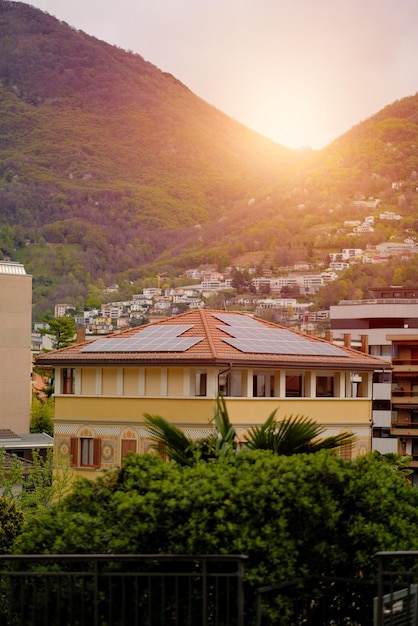 House with solar panels on the roof Natureproduced energy Sunproduced energy Photovoltaic syste