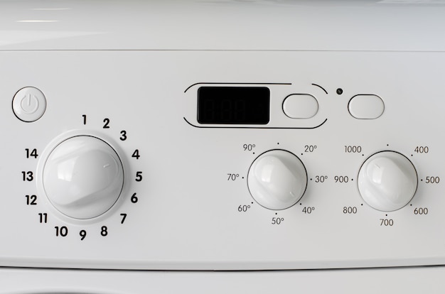 Household appliances concept. A part of washing machine control panel. 