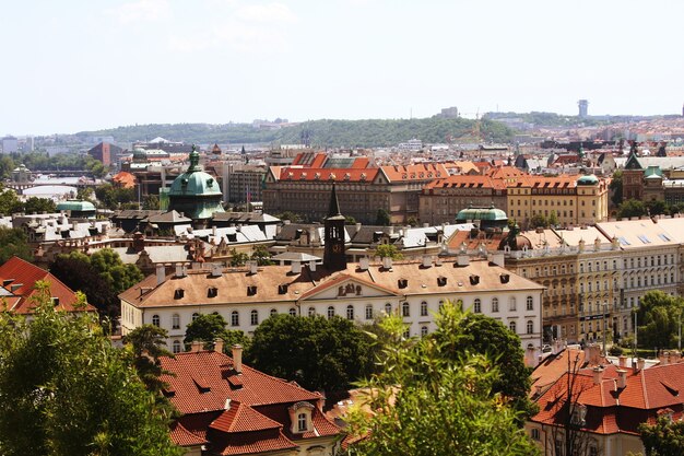 Houses with traditional red roofs in Prague. Travel photo