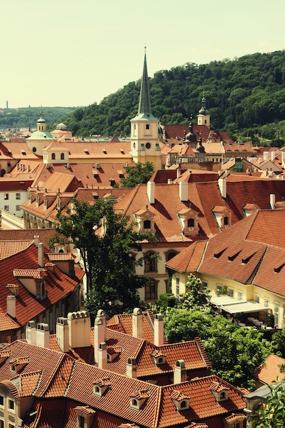 Houses with traditional red roofs in Prague. 