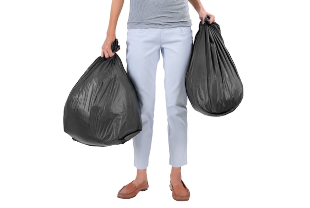 Housewife holding garbage bags isolated on white