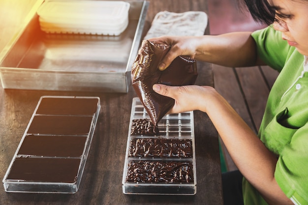 Housewife making handmade chocolates at home