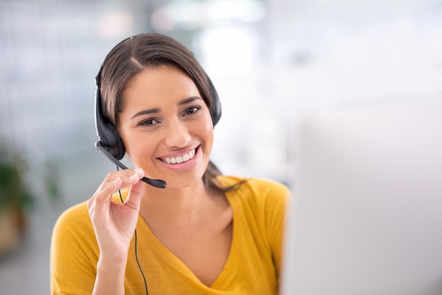 How can I help you today. Portrait of an attractive young customer service representative wearing a headset.