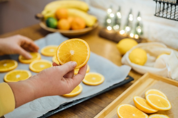 How to dry orange slices for eco friendly zero waste holiday decor close up process of drying orange