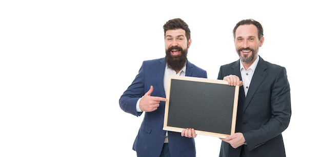 Hr hiring Men successful entrepreneurs Economic education Business academy Join our company Business people concept Men bearded guys wear formal suits Well groomed business man hold chalkboard