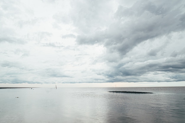 Huge cloud over ocean horizontal landscape