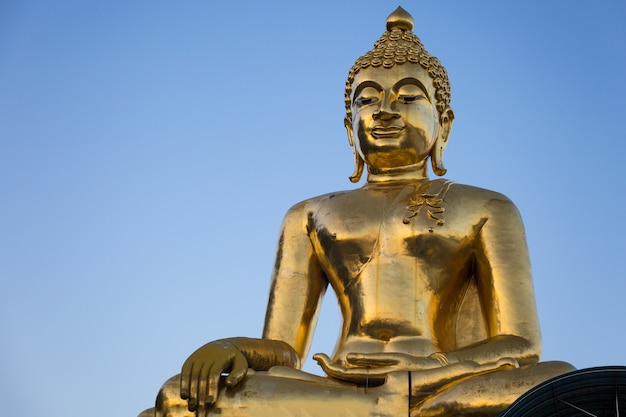 Huge golden Buddha sculpture