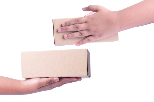 Human hand holding cardboard box isolated over white background