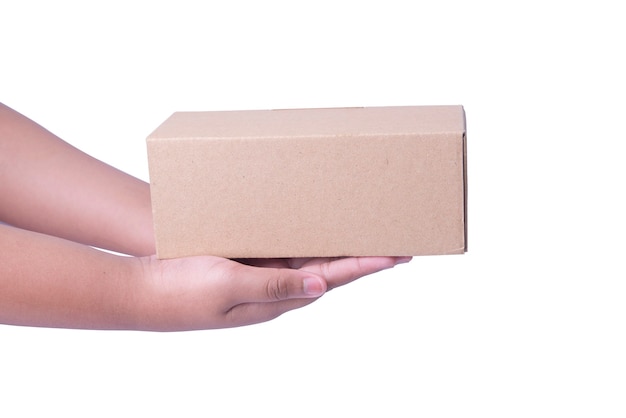 Human hand holding cardboard box isolated over white background