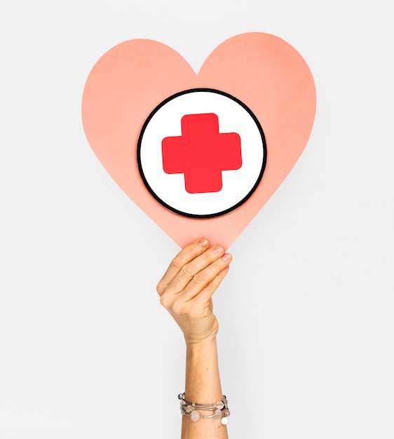 Human Hand Holding Heart Red Cross