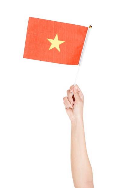 Human hand holding Vietnam national flag