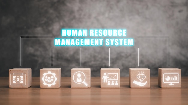 Photo human resource management system concept wooden block on desk with human resource management system icon on virtual screen