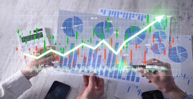 Human showing graph and stock market statistics Forex trading analysis