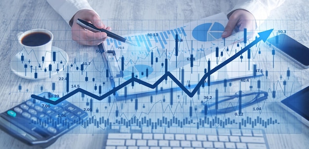 Human showing graph and stock market statistics Forex trading analysis