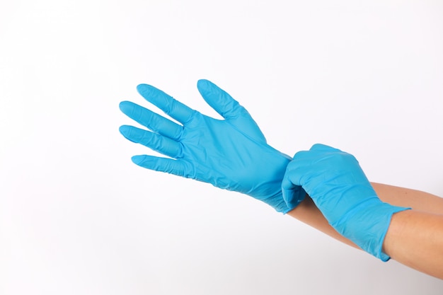 Human wearing glove on white background. 