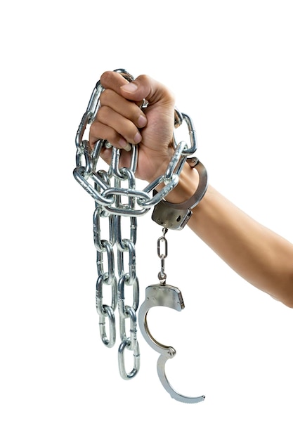 Humans hand with handcuff tied with a chain of metal steel