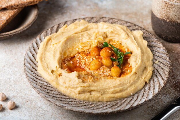 Hummus with crispbread Healthy snack Vegetarian food Chickpea hummus