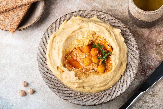 Hummus with crispbread Healthy snack Vegetarian food Chickpea hummus