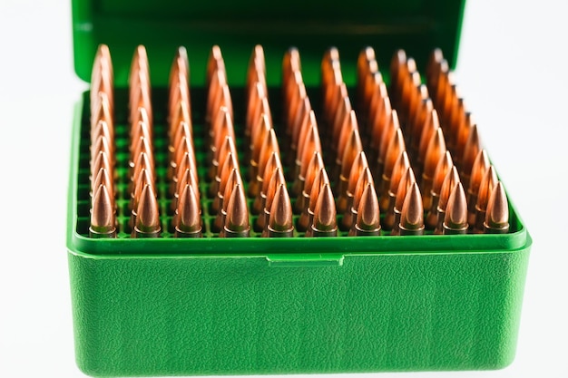 Hunting cartridges in a plastic box. Bullet storage box.